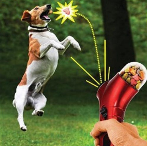 Interactive dog treat launcher